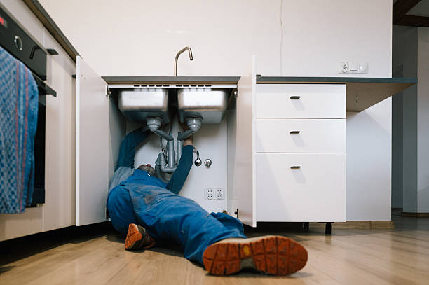 Professional Drain Cleaning technician working in Attica, IN
